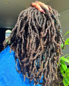 Instagram post by @amira.locs